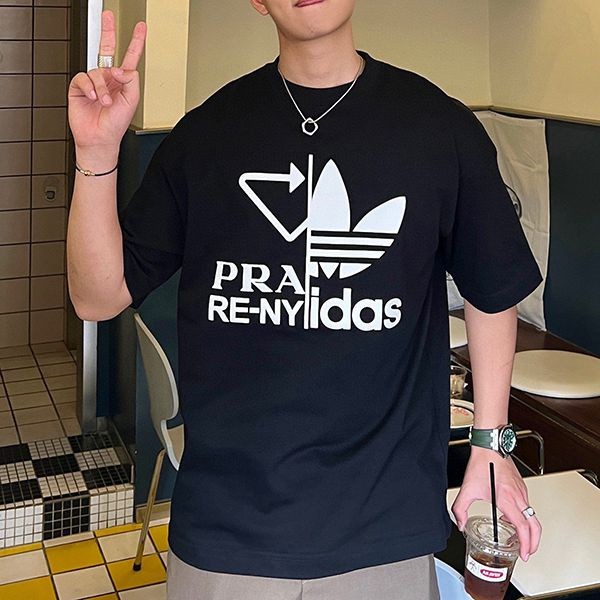 大人気!!新色プラダ アディダス 偽物 刺繍入り ジャージー ロゴTシャツ pum93404
