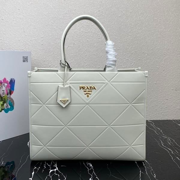 n級品 おすすめプラダ 偽物 ステッチモチーフ ラージ レザー ハンドバッグ 3サイズ puh27282