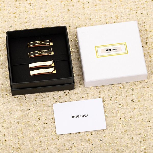 ミュウミュウ エナメルメタル 偽物 ヘアクリップ myv91032